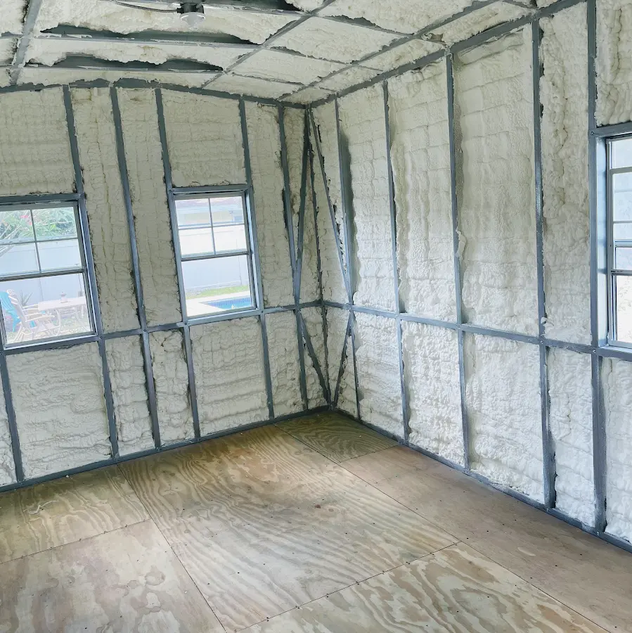 Closed-cell spray foam insulation applied to wall cavities in a residential project in Sequim